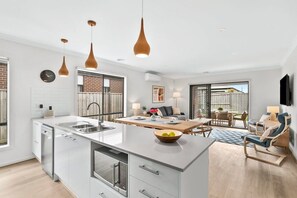 Open plan living, dining and kitchen