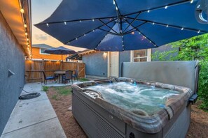 Enjoy a nice cup of coffee in the morning, a glass of wine in the evening, or just sometime after a long day in this brand-new 5-seating jacuzzi.