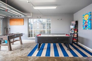 Unwind and enjoy in this stylish entertainment area designed for fun.