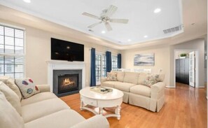 Large Family Room with cozy seating and Flatscreen TV