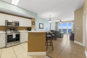 The fully equipped kitchen features stainless-steel appliances, and everything you need to cook meals for family and friends.