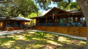 House and Bunkhouse on over 2 acres located directly on the Frio River. 