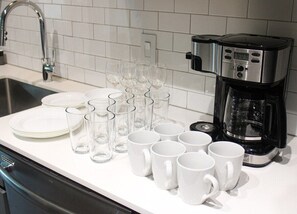 Coffee maker with single serve and full pot options + All the glassware and place settings you need!