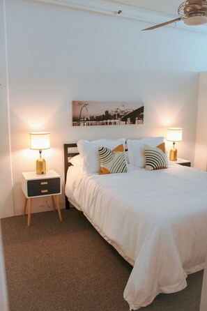 Bedroom with plush queen mattress