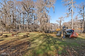 Kayaks and canoes available across the street at our other cabins