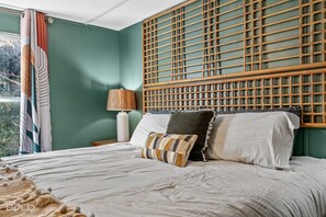 The bedroom has a king-sized bed. 