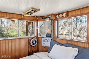 The upstairs bedroom has original instrumentation!