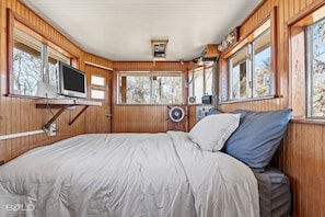 The "Captains' Quarters" second-level bedroom has a full-sized bed & 360 views!