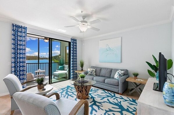 Bright south-facing living room with unobstructed views of the nature preserve