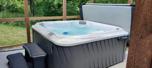 Enjoy a nice evening in the hot tub after a long day hiking!