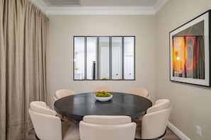 Enjoy a family meal in an elegant style in this modern dining room