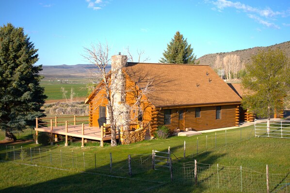 Back and porch of Log Home