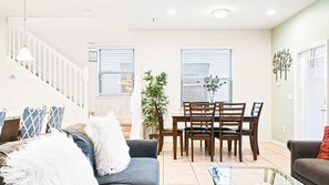 Kick back and relax in our spacious living room, where you can unwind with your favorite book or movie.