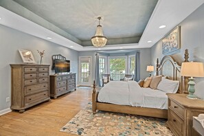 Primary bedroom with beautiful lake views!