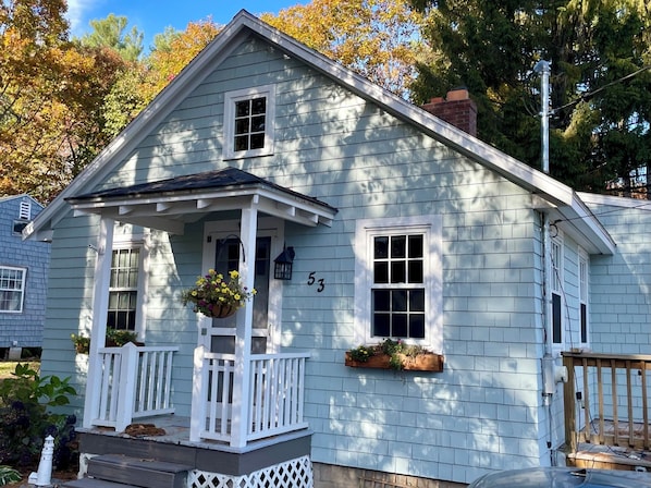 Our sweet cottage with A/C, new kitchen, outdoor shower, grill and yard.