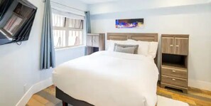 Main bedroom has a new,adjustable queen size bed, with a pillow top mattress.