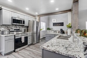 Experience culinary delight in our fully equipped kitchen, where every tool and appliance awaits your creative touch. A haven for food enthusiasts, promising a seamless and enjoyable cooking experience.