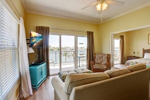 Living room with private balcony access