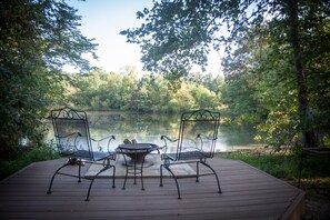 Firepit overlooking the pond.