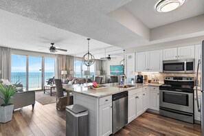 REMODELED Kitchen has GULF VIEWS, granite countertops, stainless appliances - fully stocked with more than the basics (coffee/tea bar, oils/spices, Tupperware, plenty of pots/pans/cookware)