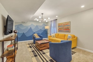 Bold colors and playful energy in the living room.
