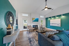 When you first enter the home, you are greeted with this spacious and beautifully decorated living room!