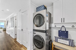 Washer and Dryer within entry way hallway.