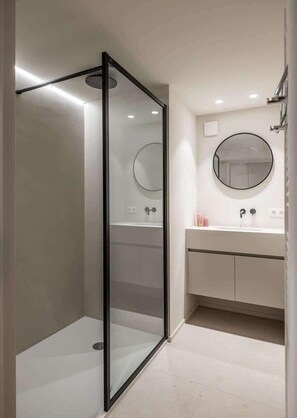 Bright bathroom with refreshing walk-in shower