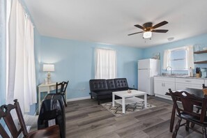 Enjoy The Living Space With Dining Table, Futon & Kitchenette