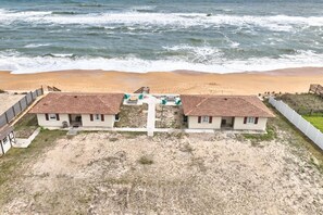 Aerial View of the Quarter Deck in Painter' Hill neighborhood of Flagler Beach, Florida (This listing is for the cottage on the RIGHT).