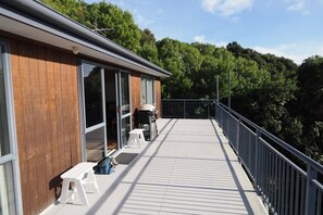 Deck and barbecue looking west to reserve