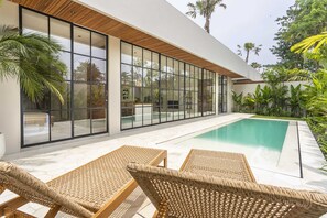 Every room in the villa has a poolside view