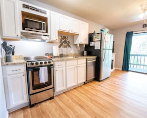 Newly renovated with new granite, appliances, flooring, and more