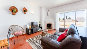 The living room is great to watch some TV and rest. Also has access to the balcony and it's view 
#livingroom #balcony #view #algarve #portugal