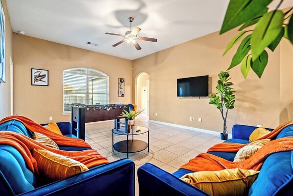 Laughter guaranteed in this entertainment hub!  Whether you're belting out karaoke tunes, cheering on your team, or battling it out on the foosball pitch, memories will be made here!