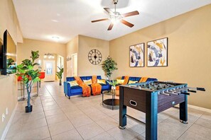 Game on! Get ready for epic foosball battles in this lively living room. May the best player (or team) win!