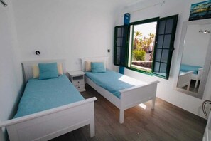 Second bedroom with twin beds, with AC, built in wardrobe and sea views
