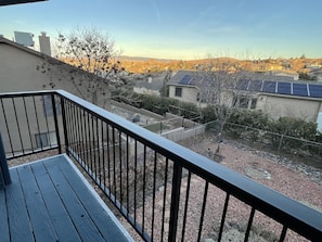 View from the balcony of red mountains and Watson lake
