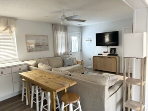 Kitchen meets living room creating a hub of connection and comfort. 