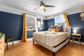 The master bedroom offers a comfy queen as well as a wide screen TV.