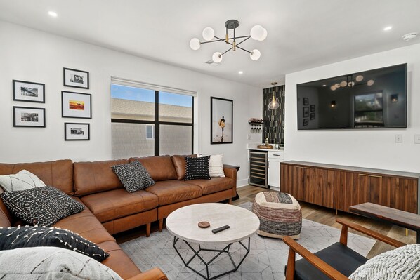 Large living area comfortably seats 7 adults.
