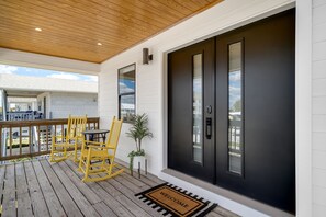 Welcoming spacious covered front porch perfect for watching the sunsets.