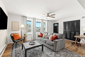 Enjoy the comforts of this inviting living room, complete with a smart TV to keep you entertained during your stay.