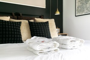 Master bedroom with king Serta iComfort mattress, en suite bathroom, smart TV