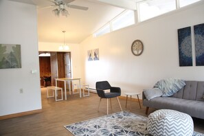 Living room/dining area leading to den/office.  