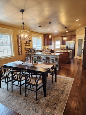 Fully equipped and immaculate kitchen with large dining table