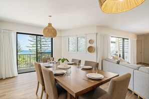 Enjoy indoor dining with a beautiful blue backdrop of the ocean.