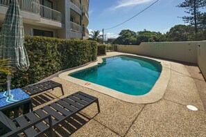 Enjoy cooling off in the complex pool area.