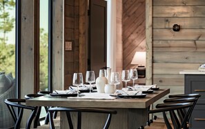 Savor meals with loved ones around our spacious dining table, where every bite comes with a side of mountain views.
