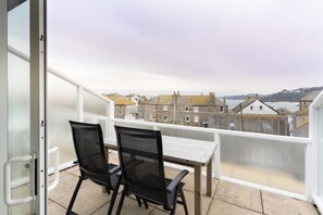 Balcony overlooking the rooftops to Porthminster point